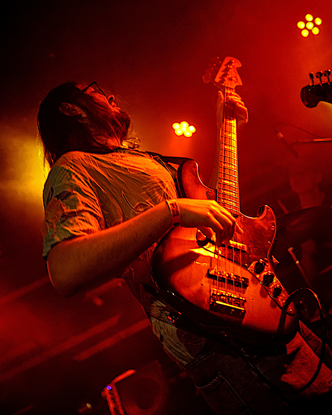 Thanos performing live on bass in 2024